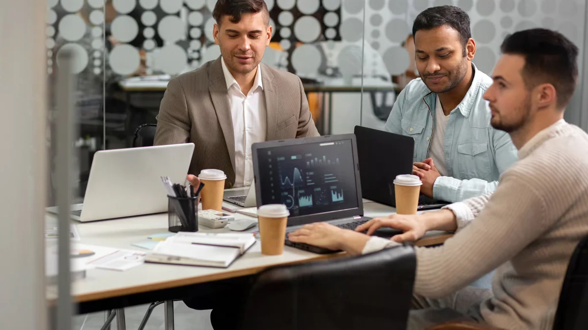 Technology professional utilizing AI automation tools on an office workstation