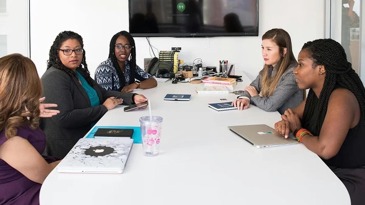 Professional presenting a transferable skills portfolio for a career transition