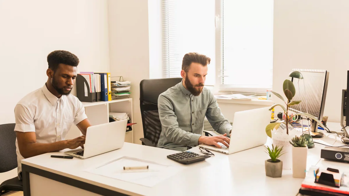 Independent consultant presenting a service retainer agreement to a business client