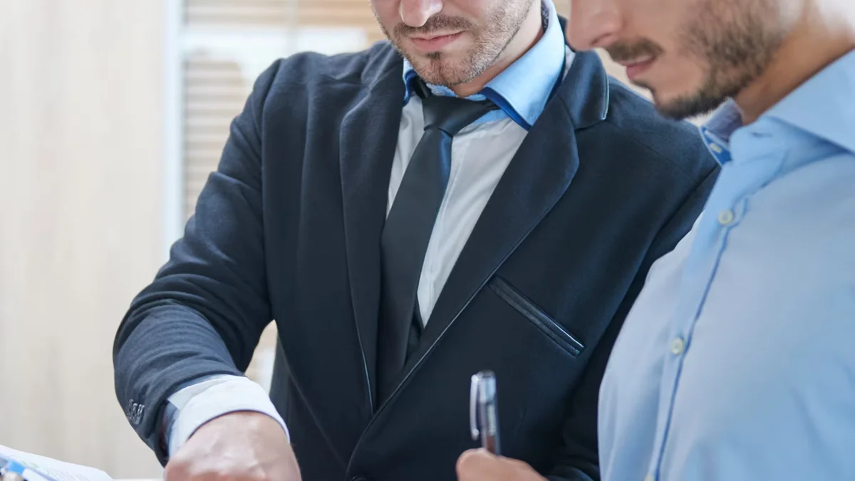 Professional reflecting on career accomplishments with confidence