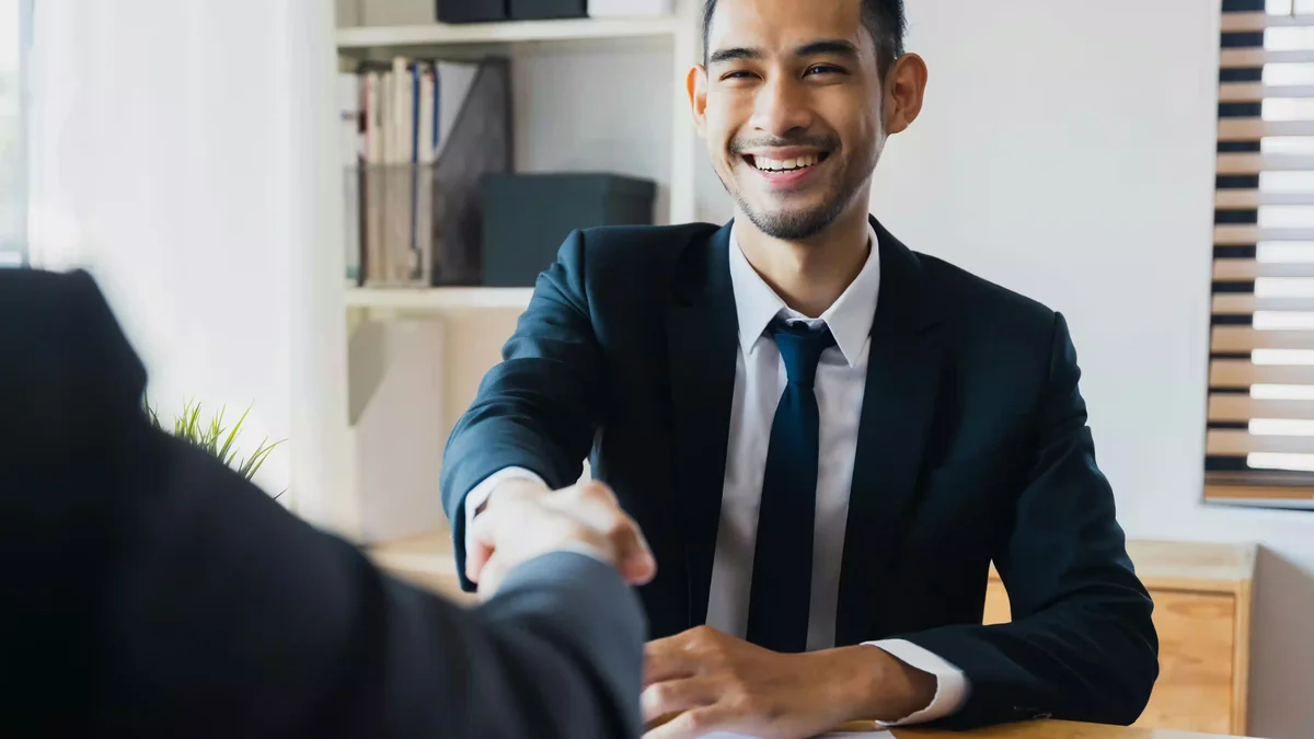 Experienced professional evaluating career pivot strategies with colleagues